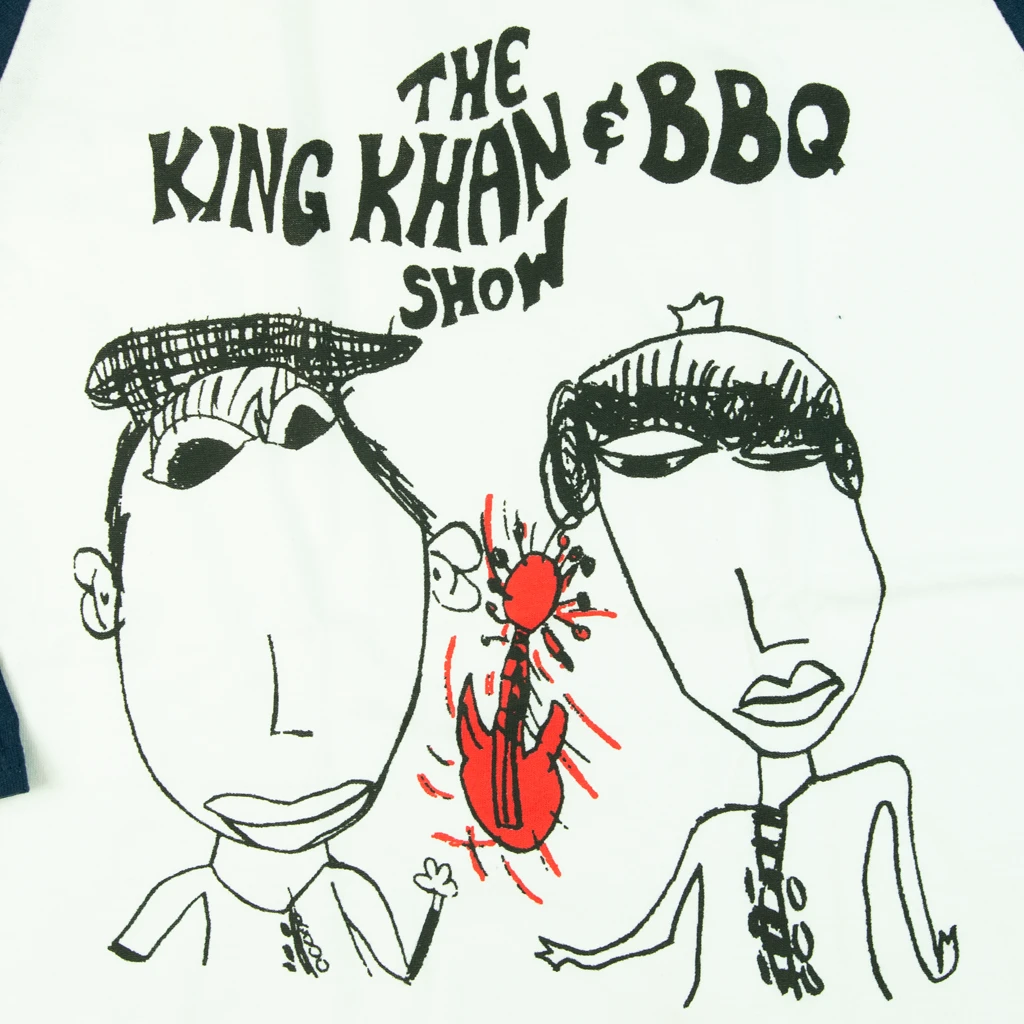 The King Khan & BBQ Show New Merch Red Guitar White & Navy Baseball Tee 2 The King Khan & BBQ Show New Merch Red Guitar White & Navy Baseball Tee